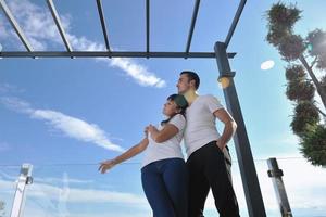 couple relaxing on balcony photo