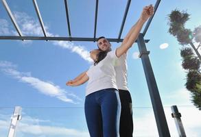 couple relaxing on balcony photo