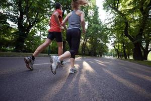 couple jogging outside photo