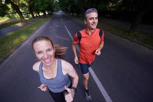 couple jogging outside photo