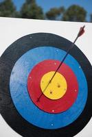 Arrow in the center of target for archery, closeup photo