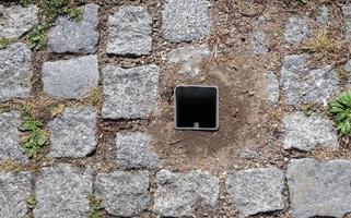 Detailed close up on old historical cobblestone roads and walkways photo