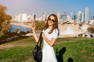 Young attractive woman taking selfie photo