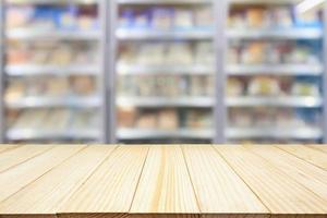 wood table with supermarket commercial refrigerators photo