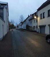 Old residential building in Germany. Cloudy and dusk. Gothic atmosphere photo