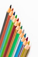 Set of colored pencils on white background. Back to school concept. Place for text. photo