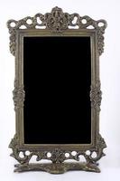 Antique blank photo frame with black interior