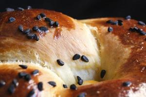 Yummy fresh bun and black cumin seeds photo