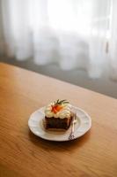 pieces of carrot cake on white dish.Homemade bakery concept. photo