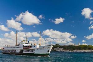 Ferry in front of Topkapi Palace photo