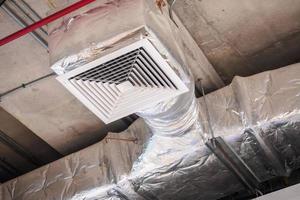 Ceiling air duct in large shopping mall photo