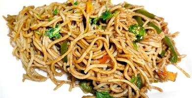 Schezwan Noodles or vegetable Hakka a popular Indo-Chinese recipe photo