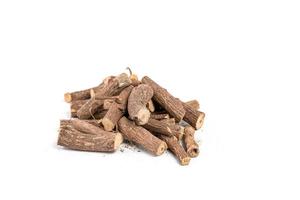 Ayurvedic Mulethi or Liquorice root stick or jeshthamadh on white background photo