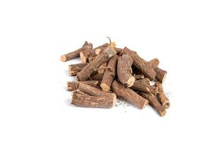 Ayurvedic Mulethi or Liquorice root stick or jeshthamadh on white background photo