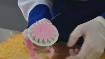 Closeup of cook hands making sweet figurines video