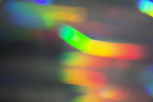 fondo de bokeh holográfico de arco iris. desbordamientos multicolores de color. foto