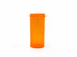 Red or orange plastic or glass for contain pills or capsule bottle isolated on white background. Object for container and shape. photo