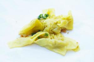 Yellow dumpling. Stuffed with minced pork . Concept,   Traditional food. Appetizer for a party or serve as main dish. Delicious and healthy food photo