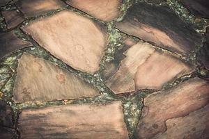 Stone floor texture background from natural stones vintage color photo