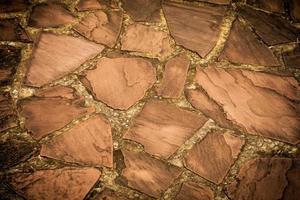 Stone floor texture background from natural stones vintage color photo