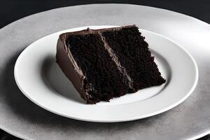 Slice of chocolate cake on the white plate. photo