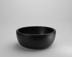 Empty black bowl on white background photo