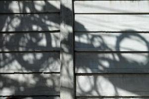 Messy Communication Line Shadow on Concrete Wall Background. photo