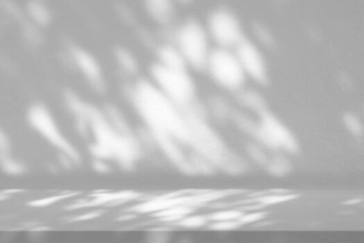 Concrete Table with Nature Shadow on Loft Wall Texture Background, Suitable for Cosmetic Product Presentation Backdrop, Display, and Mock up. photo