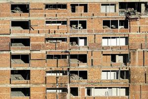 Building brick wall pattern and construction site photo