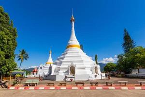 White unique pagoda in Wat Phra That Doi Gongmoo landmark of Maehongson, Thailand. photo