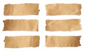 Torn brown paper sheet set on isolated white background photo