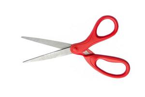 Scissors red on isolated white. photo