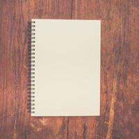 brown book paper on wood table. photo