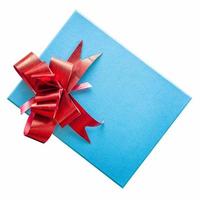 blue gift box with red ribbon on isolated white, clipping path. photo