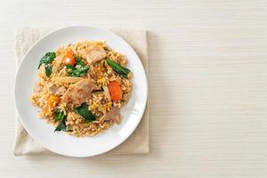 Fried rice with pork on plate photo