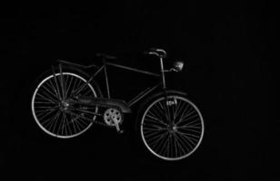 vintage mini bicycle on black canvas photo