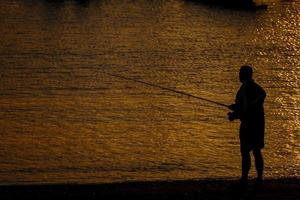 Fishing at dusk - Spain 2022 photo