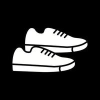 icono de vector de zapatillas