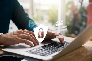 Cybersecurity and privacy concepts to protect data. Lock icon and internet network security technology. Businessmen protecting personal data on virtual interfaces. photo