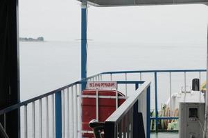 the atmosphere on the edge of the ferry crossing bali photo