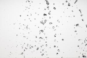 Falling water on a white background photo