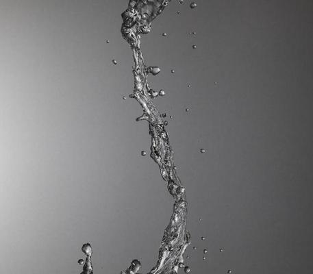 Falling water on a silver background