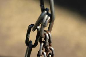 Close-up metal chain with blurry background photo