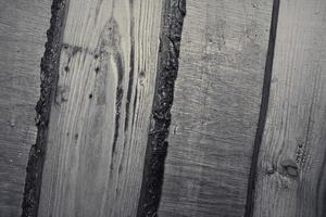 Wooden surface showing planks and grain textures in high resolution. photo