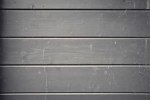 Wooden surface showing planks and grain textures in high resolution. photo