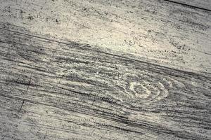 Wooden surface showing planks and grain textures in high resolution. photo