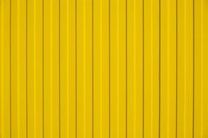 resumen amarillo antecedentes con vertical líneas. foto