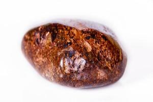 Macro mineral stone Bronze on white background photo