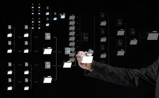 Scheme of automation of electronic document management and male hand. Transfer and archiving of documents photo