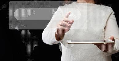 A woman stands with an electronic tablet and an input line to search for a site, information on the world wide web of the Internet photo